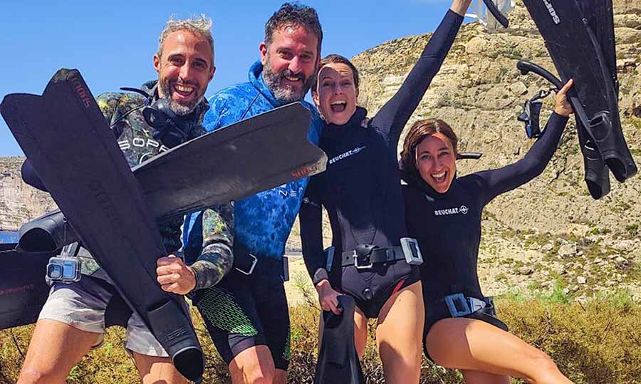 Advanced Freedivers cheering after an amazing session in Gozo